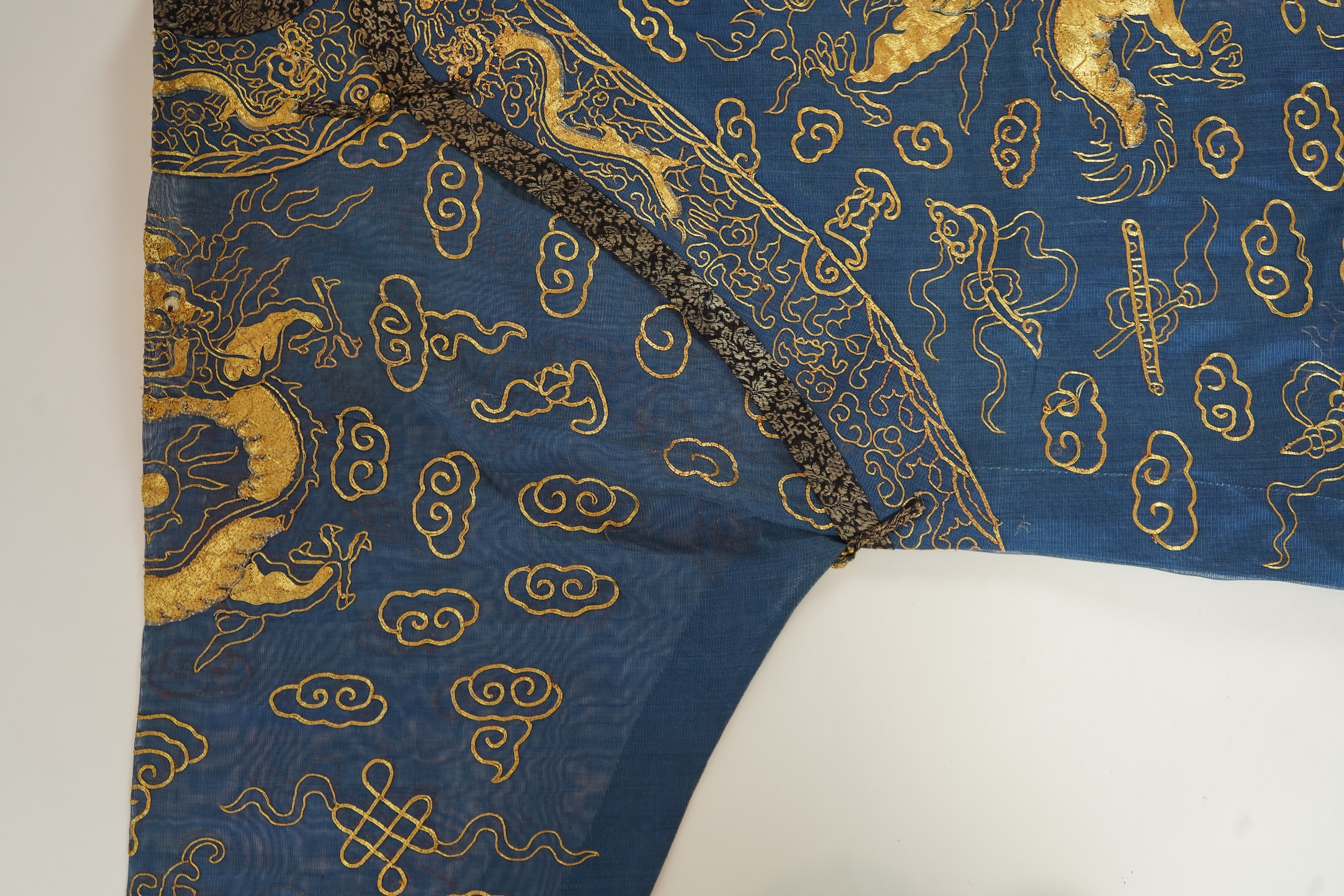 A Chinese gold thread and silk gauze ‘dragon’ summer robe, jifu, early 20th century